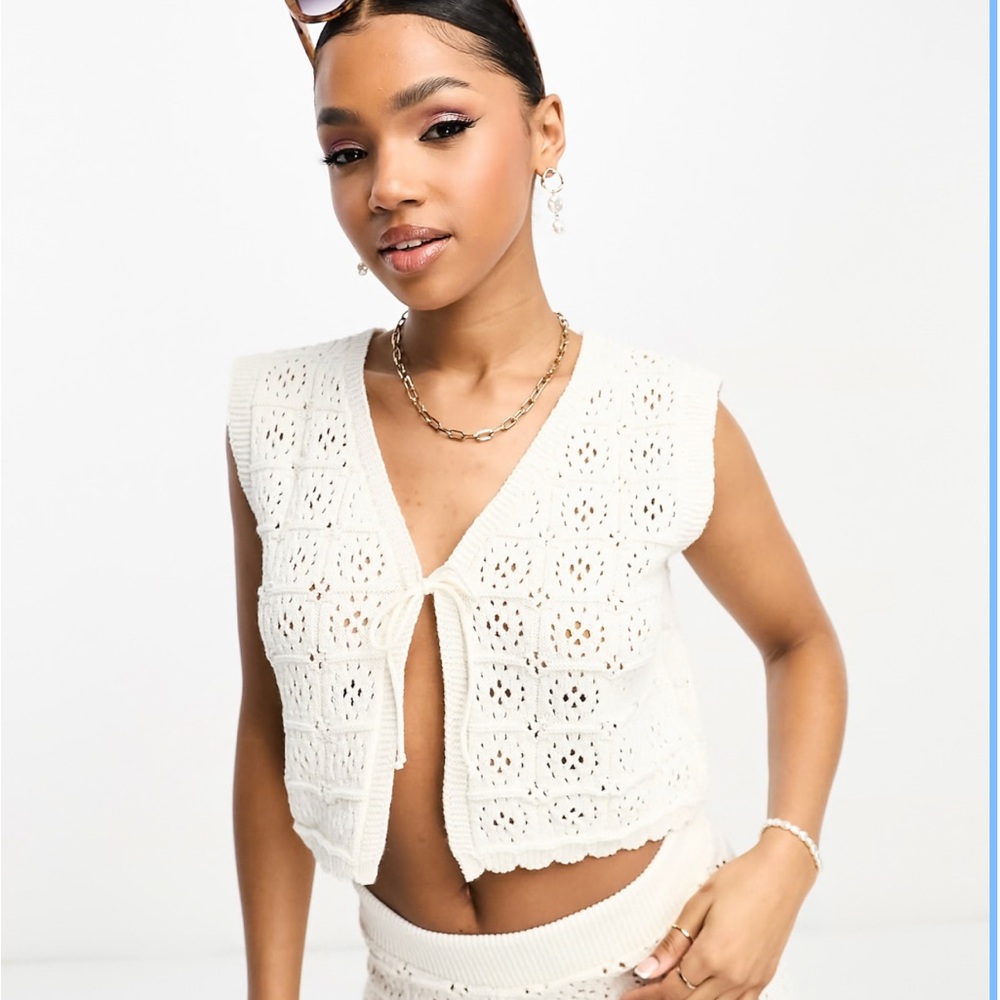 Knitted crochet tie front vest